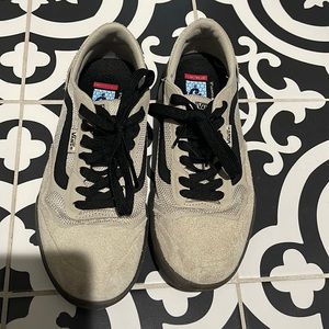 Vans, tan and black shoes